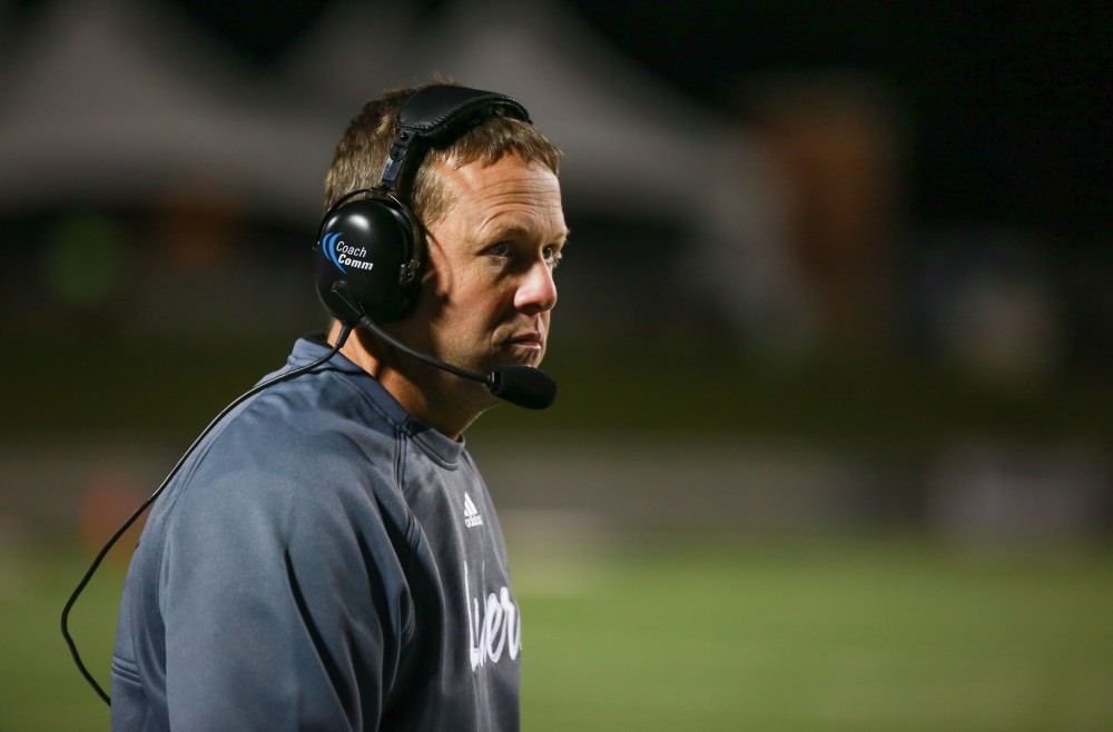 GVL / Kevin Sielaff -  Head coach Matt Mitchell looks toward the play. Grand Valley squares off against Michigan Tech Oct. 17 at Lubbers Stadium in Allendale. The Lakers defeated the Huskies with a score of 38-21.