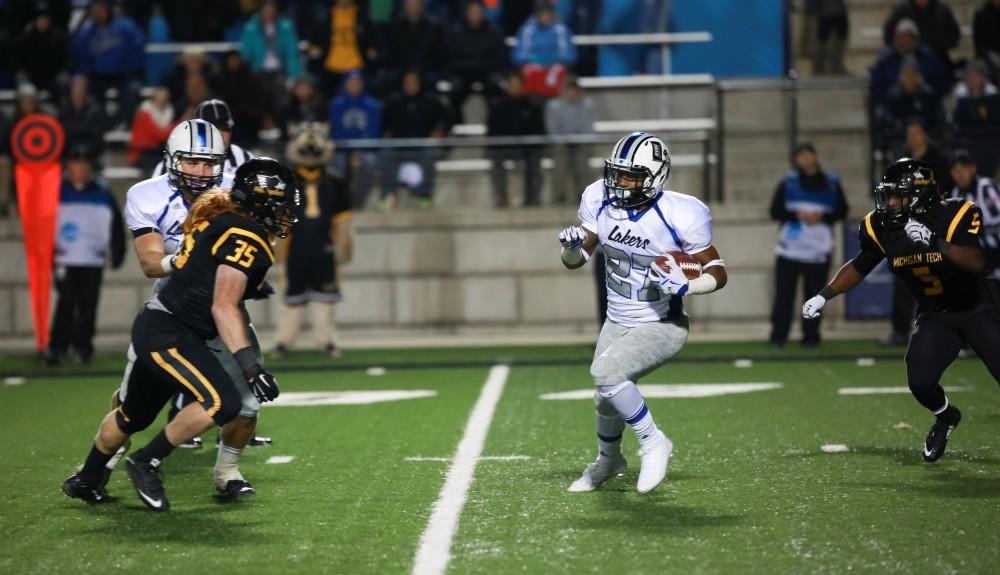 GVL / Kevin Sielaff - Kirk Spencer (27) heads toward the Huskies end zone.  Grand Valley squares off against Michigan Tech Oct. 17 at Lubbers Stadium in Allendale. The Lakers defeated the Huskies with a score of 38-21.