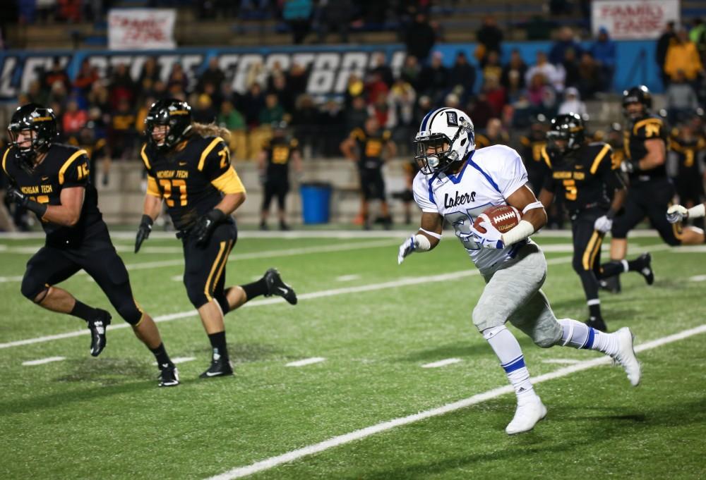 GVL / Kevin Sielaff -  Kirk Spencer (27) races down field after a punt return.  Grand Valley squares off against Michigan Tech Oct. 17 at Lubbers Stadium in Allendale. The Lakers defeated the Huskies with a score of 38-21.