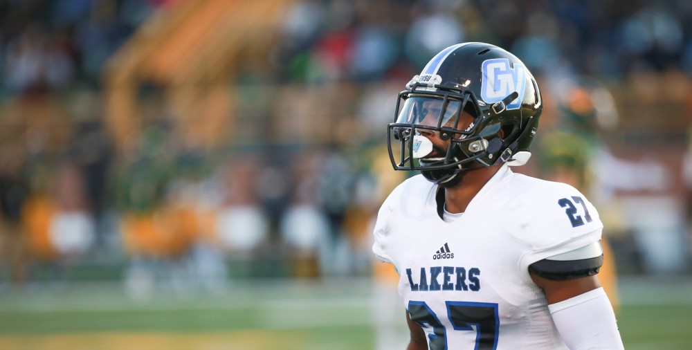 GVL / Kevin Sielaff - Kirk Spencer (27) returns to the sideline. Grand Valley squares off against Wayne State University Oct. 11 in Detroit, MI. The Lakers surged to a 38-17 victory vs. the Warriors.