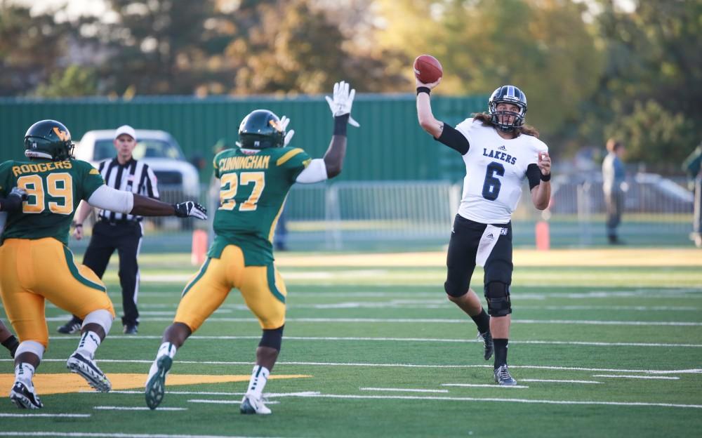 GVL / Kevin Sielaff - Bart Williams (6) throws a long pass downfield. Grand Valley squares off against Wayne State University Oct. 11 in Detroit, MI. The Lakers surged to a 38-17 victory vs. the Warriors.