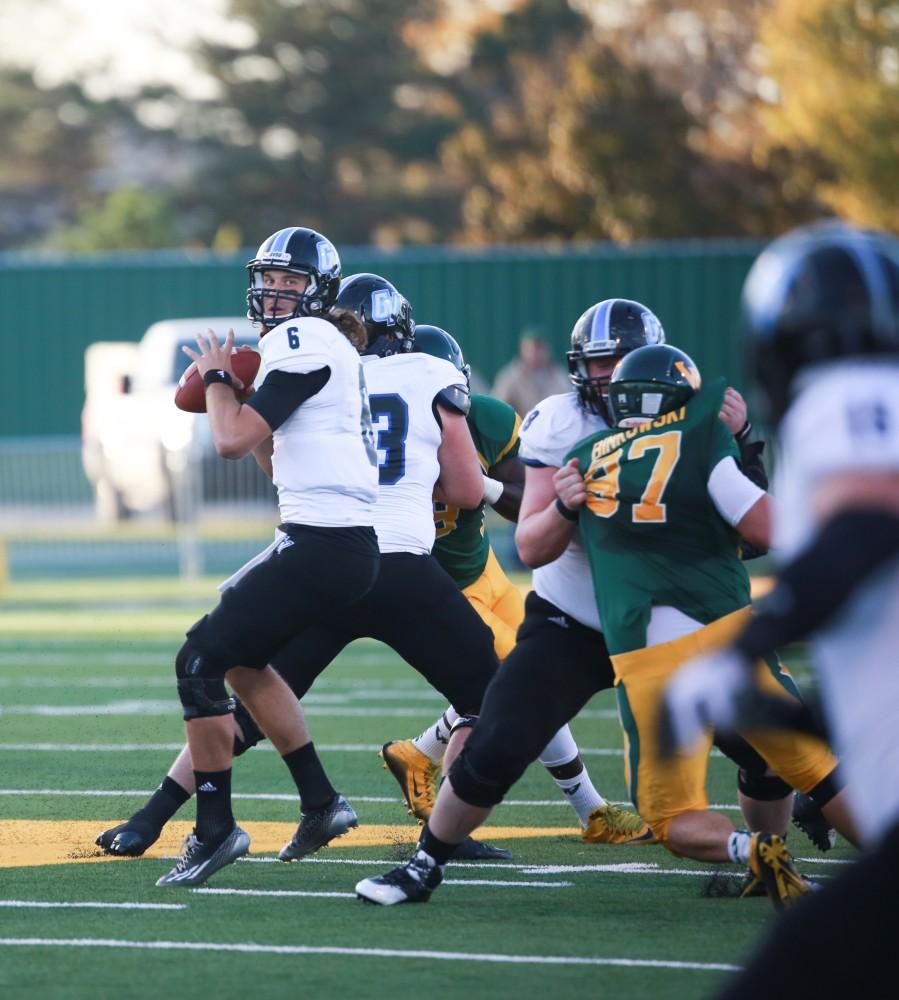 GVL / Kevin Sielaff - Bart WIlliams (6) lines up a pass. Grand Valley squares off against Wayne State University Oct. 11 in Detroit, MI. The Lakers surged to a 38-17 victory vs. the Warriors.