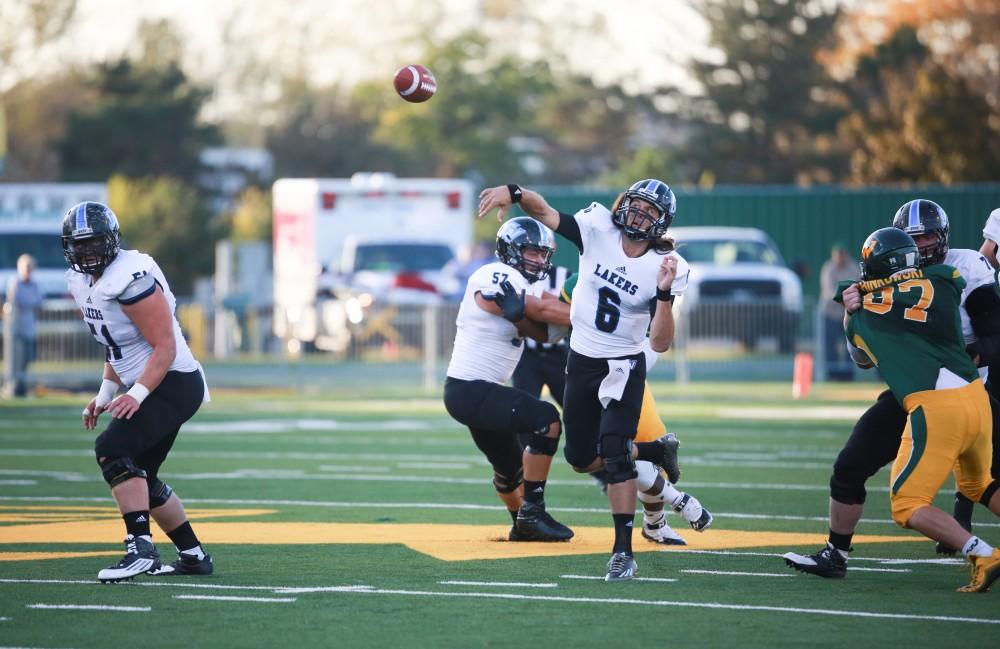 GVL / Kevin Sielaff - Bart Williams (6) throws the ball downfield. Grand Valley squares off against Wayne State University Oct. 11 in Detroit, MI. The Lakers surged to a 38-17 victory vs. the Warriors.