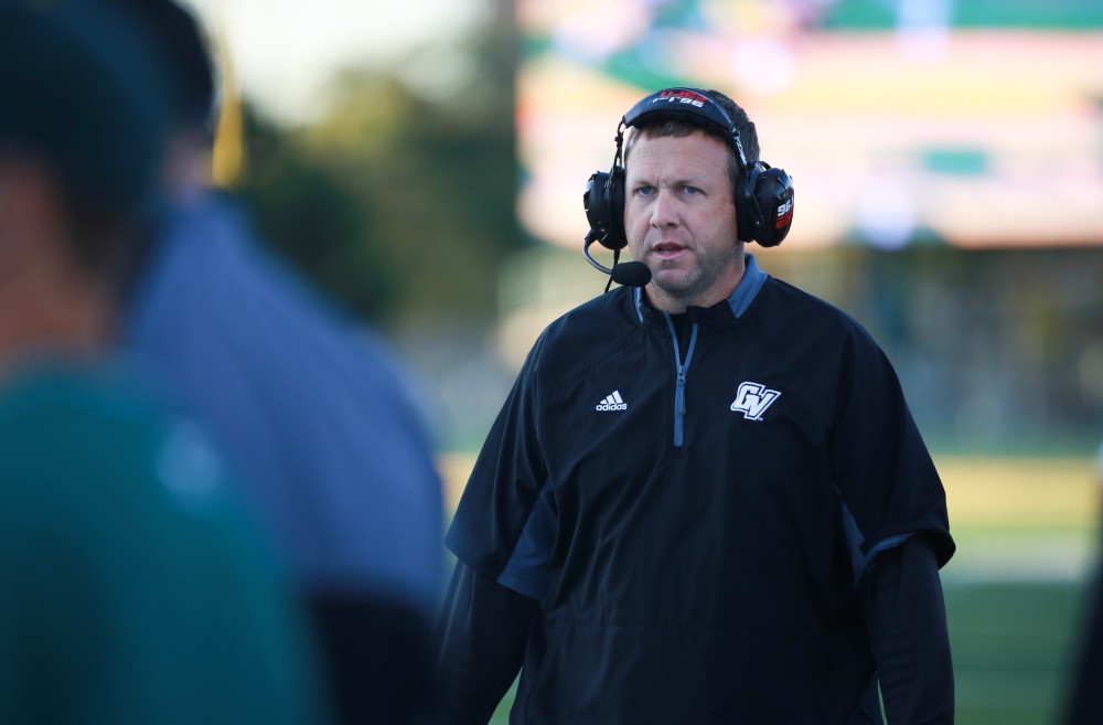 GVL / Kevin Sielaff - Head coach Matt Mitchell patrols the sidelines. Grand Valley squares off against Wayne State University Oct. 11 in Detroit, MI. The Lakers surged to a 38-17 victory vs. the Warriors.