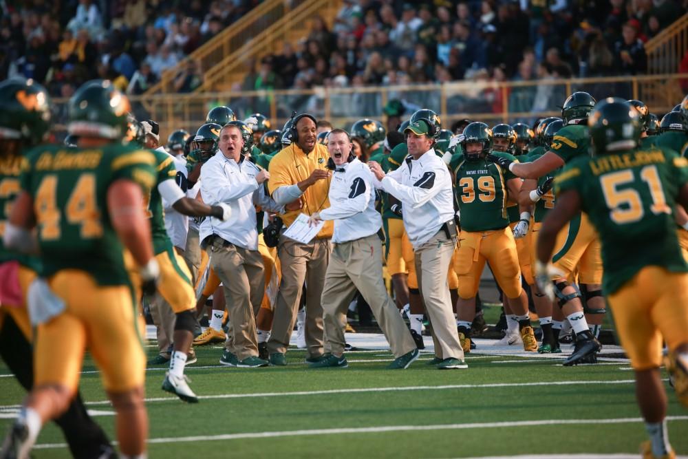 GVL / Kevin Sielaff - After an interception, the Wayne State bench celebrates. Grand Valley squares off against Wayne State University Oct. 11 in Detroit, MI. The Lakers surged to a 38-17 victory vs. the Warriors.