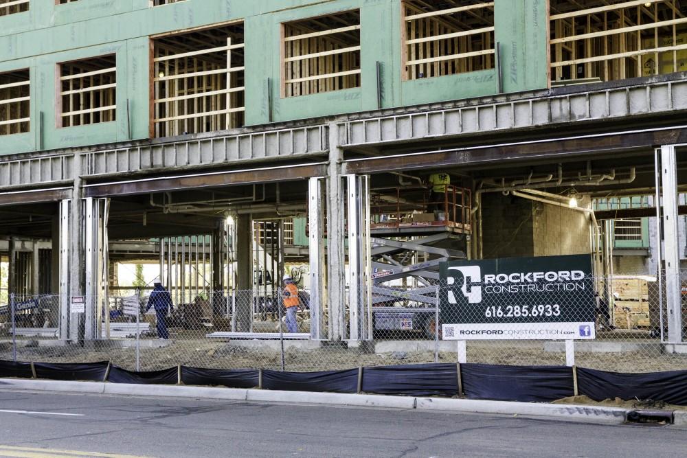 GVL / Sara Carte
Rockford Construction works on Grand Valley’s new housing, Fulton Place, on Fulton Street West on Oct. 21. Fulton Place will be finished are ready for students to move in for the 2016-2017 school year.