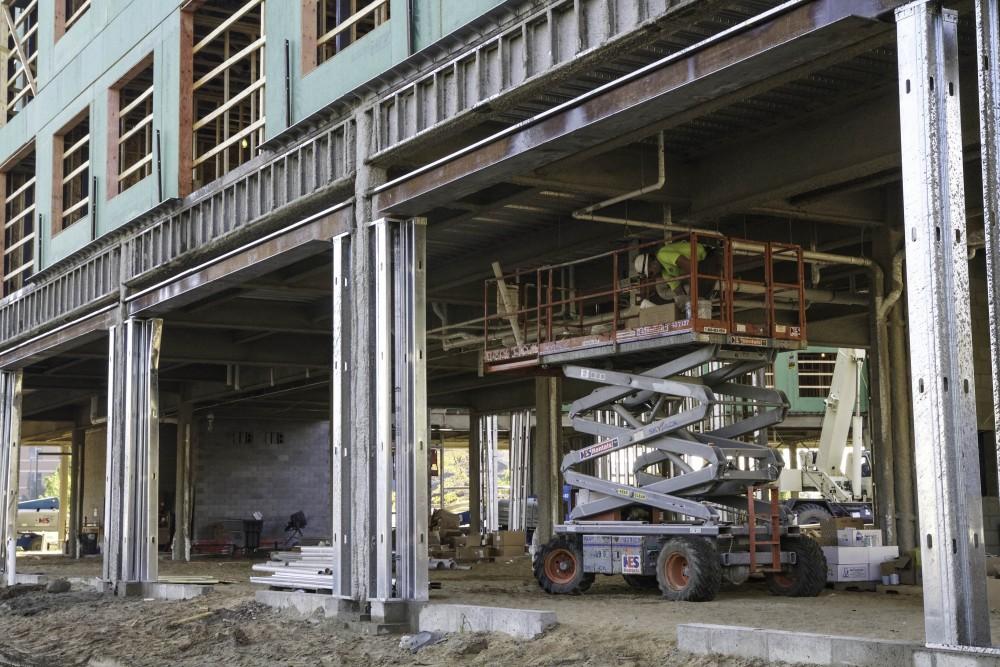 GVL / Sara Carte
Rockford Construction works on Grand Valley’s new housing, Fulton Place, on Fulton Street West on Oct. 21. Fulton Place will be finished are ready for students to move in for the 2016-2017 school year.