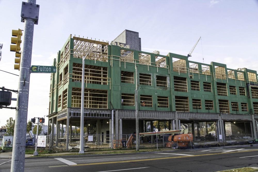 GVL / Sara Carte
Rockford Construction works on Grand Valley’s new housing, Fulton Place, on Fulton Street West on Oct. 21. Fulton Place will be finished are ready for students to move in for the 2016-2017 school year.