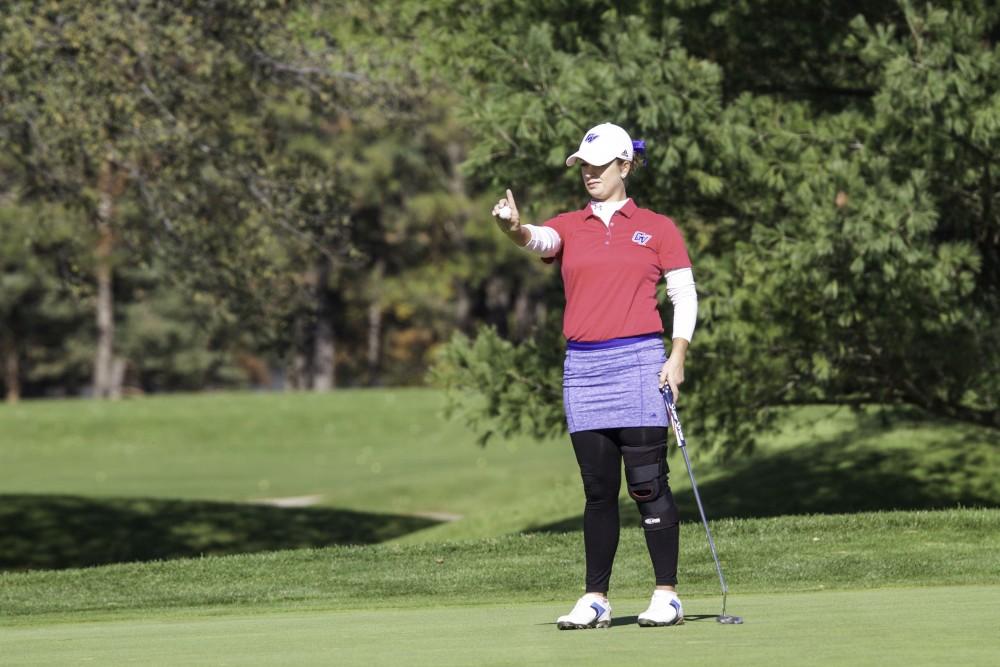 GVL / Sara Carte
Grand Valley Girl’s Golf player, Samantha Moss, lines up her put during the Davenport Invitational at the Blythefield Country Club on Oct. 26.