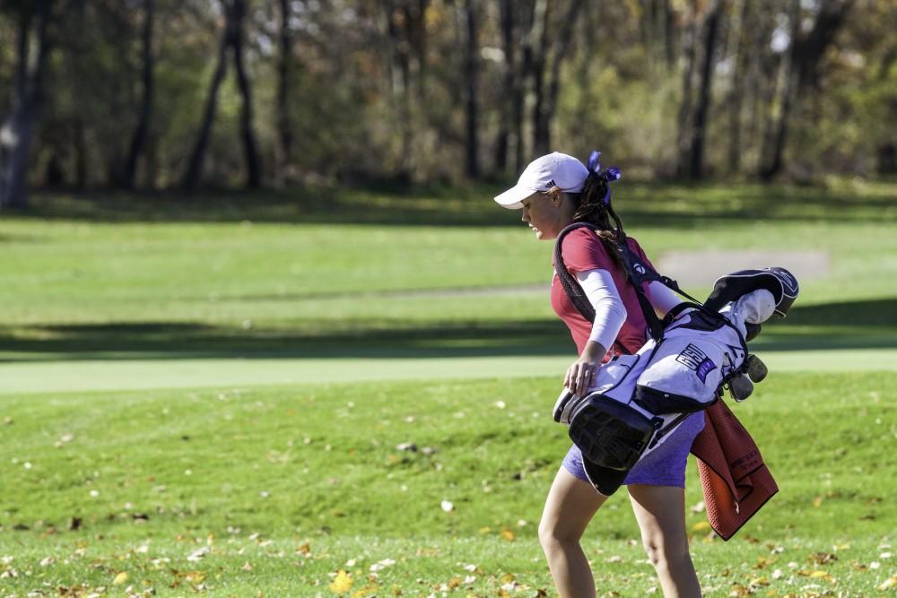 GVL / Sara Carte
Grand Valley Girl’s Golf player, Danielle Crilley, walks to the tenth hole during the Davenport Invitational at the Blythefield Country Club on Oct. 26.