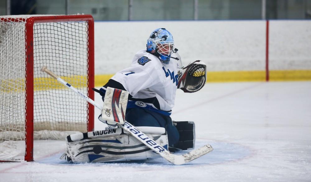 GVL / Kevin Sielaff - Goal tender Jiri Aberle (1) blocks a shot. Grand Valley's Divison II men's hockey squad squares off against Bowling Green University Oct. 16 at Georgetown Ice Arena.