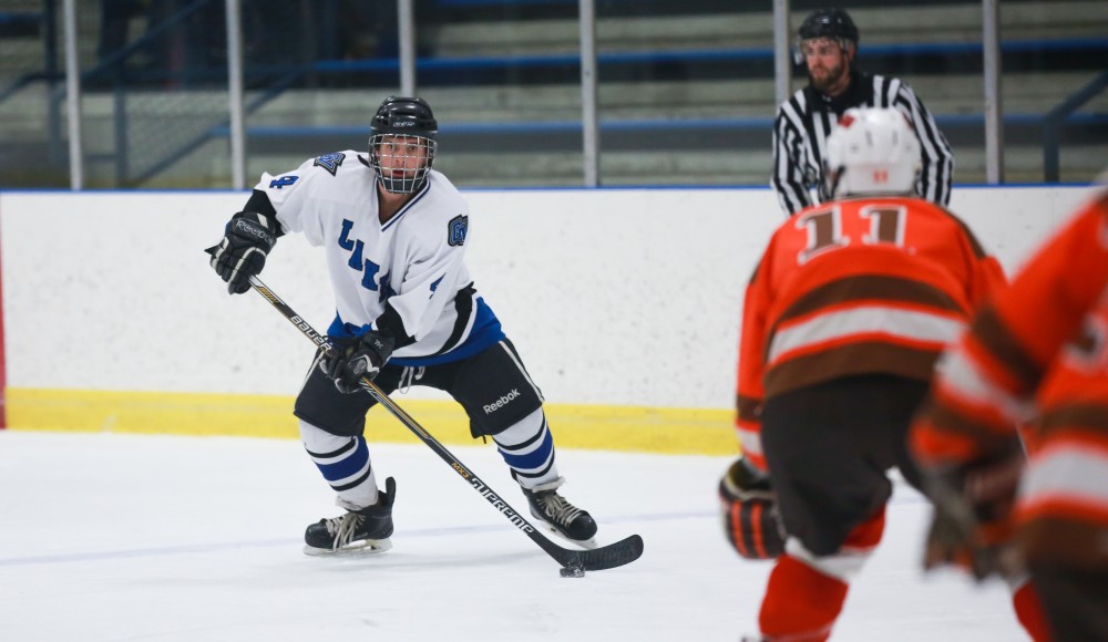 GVL / Kevin Sielaff - Tom Lusynski (3) sets up shop during a power play. Grand Valley's Divison II men's hockey squad squares off against Bowling Green University Oct. 16 at Georgetown Ice Arena.