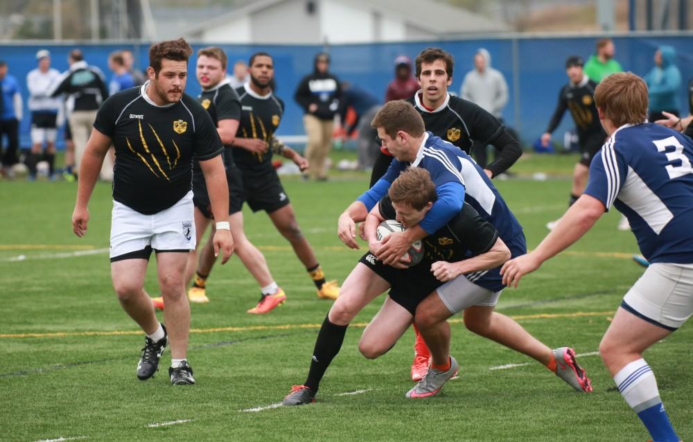 GVL / Kevin Sielaff - Grand Valley's club rugby team defeats Oakland University Oct. 3 in Allendale.