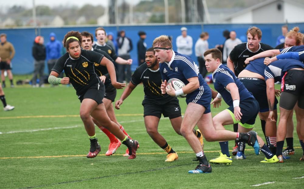 GVL / Kevin Sielaff - Grand Valley's club rugby team defeats Oakland University Oct. 3 in Allendale.