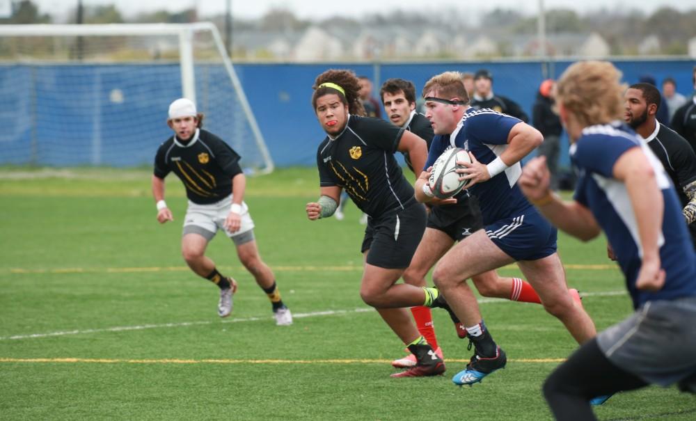 GVL / Kevin Sielaff - Grand Valleys club rugby team defeats Oakland University Oct. 3 in Allendale.