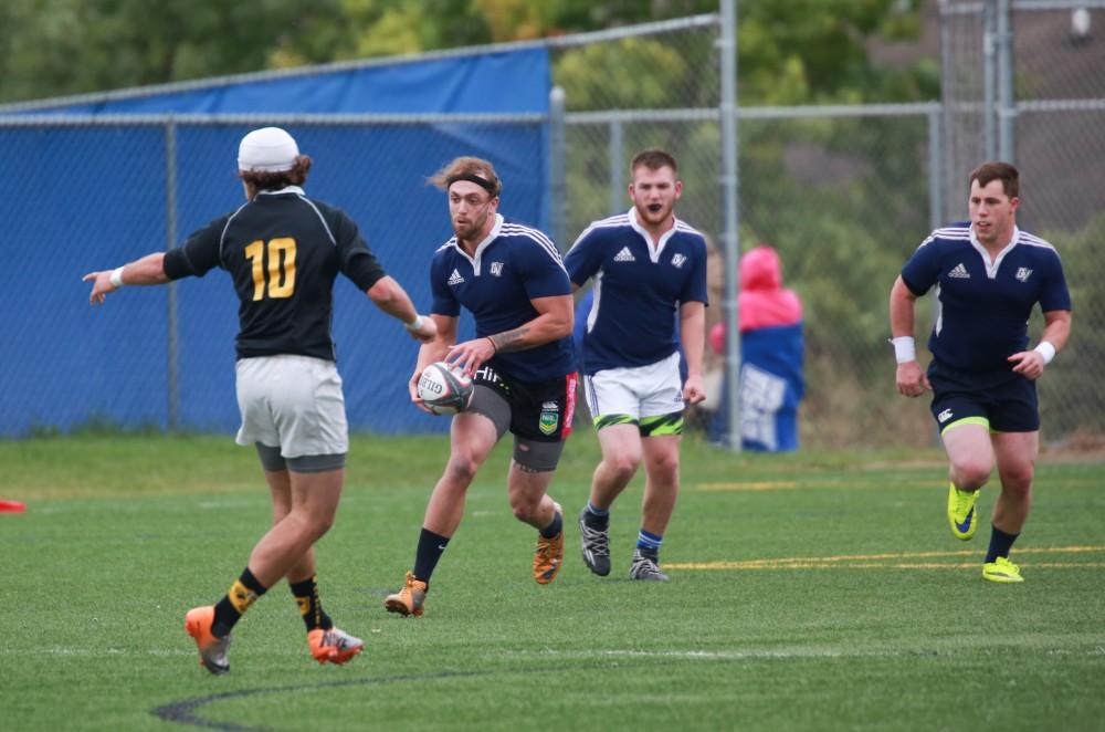 GVL / Kevin Sielaff - Grand Valley's club rugby team defeats Oakland University Oct. 3 in Allendale.