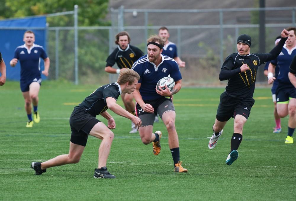 GVL / Kevin Sielaff - Grand Valley's club rugby team defeats Oakland University Oct. 3 in Allendale.