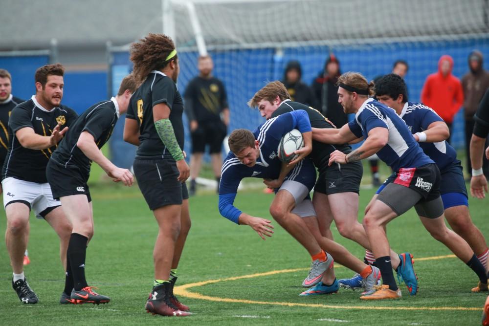 GVL / Kevin Sielaff - Grand Valley's club rugby team defeats Oakland University Oct. 3 in Allendale.