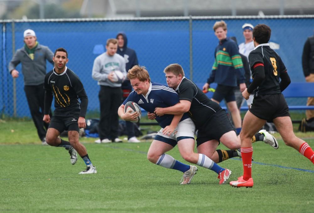 GVL / Kevin Sielaff - Grand Valley's club rugby team defeats Oakland University Oct. 3 in Allendale.