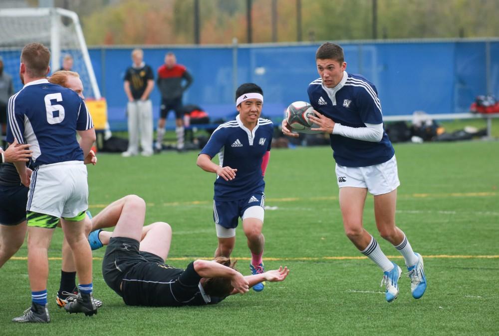 GVL / Kevin Sielaff - Grand Valley's club rugby team defeats Oakland University Oct. 3 in Allendale.