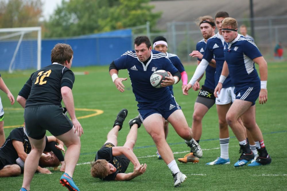 GVL / Kevin Sielaff - Grand Valley's club rugby team defeats Oakland University Oct. 3 in Allendale.