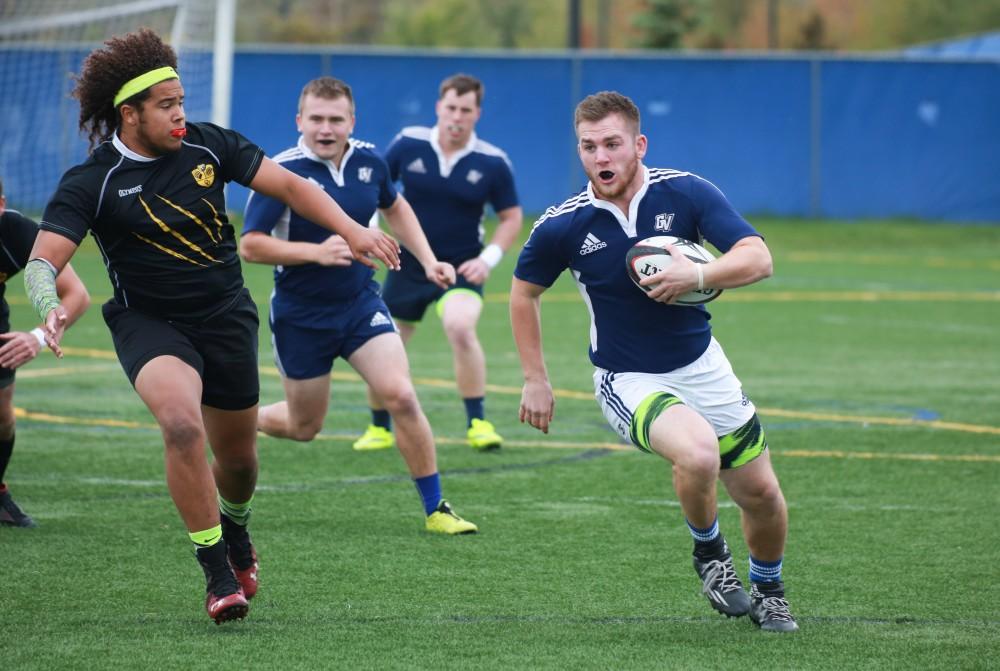 GVL / Kevin Sielaff - Grand Valley's club rugby team defeats Oakland University Oct. 3 in Allendale.