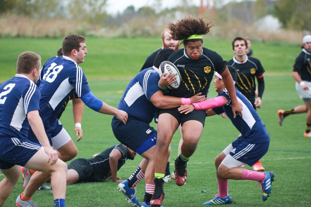 GVL / Kevin Sielaff - Grand Valley's club rugby team defeats Oakland University Oct. 3 in Allendale.