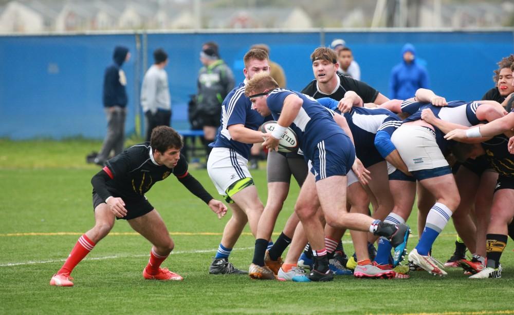 GVL / Kevin Sielaff - Grand Valley's club rugby team defeats Oakland University Oct. 3 in Allendale.