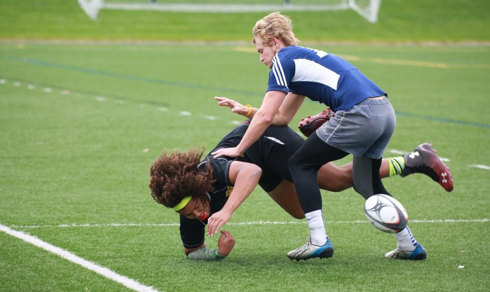 GVL / Kevin Sielaff - Grand Valley's club rugby team defeats Oakland University Oct. 3 in Allendale.