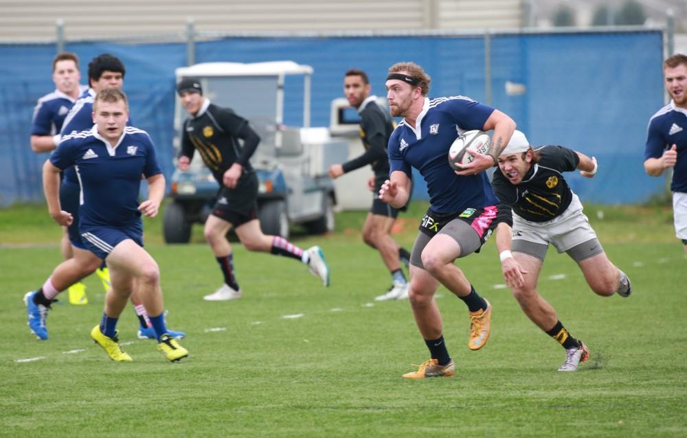 GVL / Kevin Sielaff - Grand Valley's club rugby team defeats Oakland University Oct. 3 in Allendale.