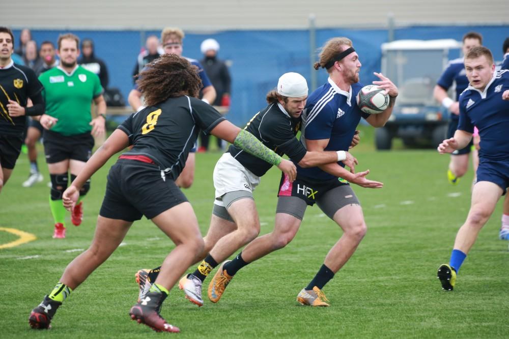 GVL / Kevin Sielaff - Grand Valley's club rugby team defeats Oakland University Oct. 3 in Allendale.