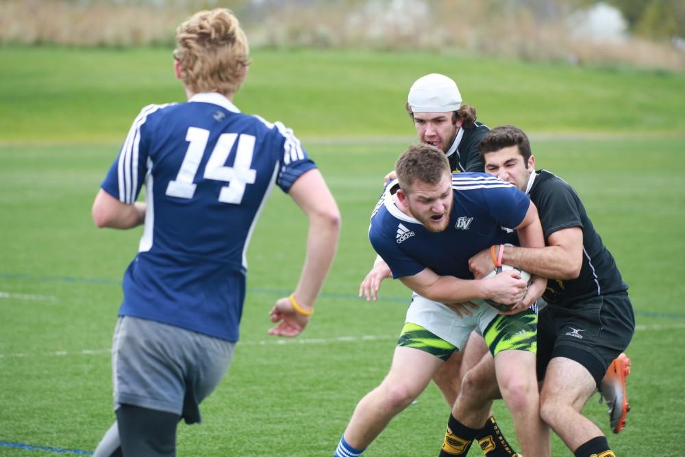 GVL / Kevin Sielaff - Grand Valley's club rugby team defeats Oakland University Oct. 3 in Allendale.