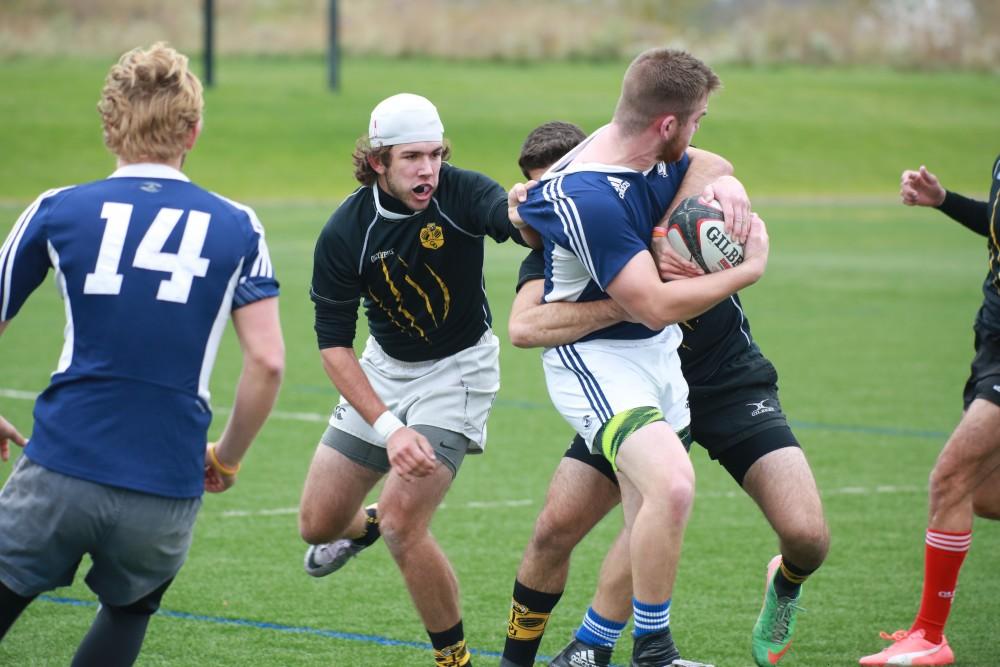 GVL / Kevin Sielaff - Grand Valley's club rugby team defeats Oakland University Oct. 3 in Allendale.