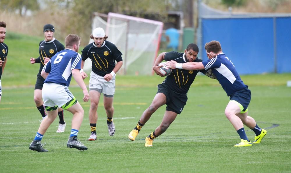 GVL / Kevin Sielaff - Grand Valley's club rugby team defeats Oakland University Oct. 3 in Allendale.