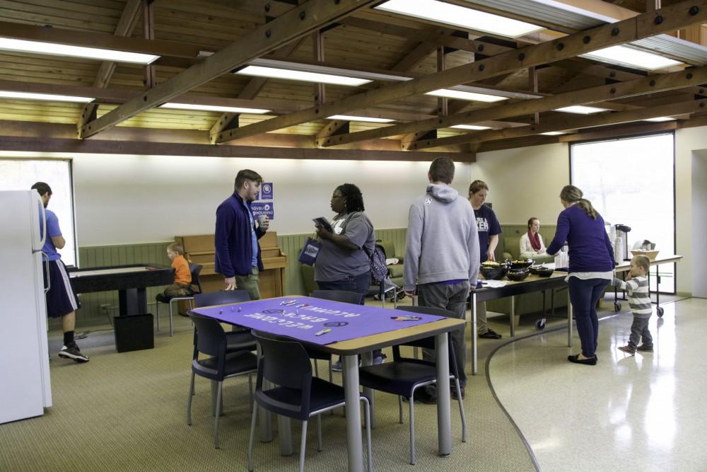 GVL / Sara Carte
Grand Valley Alumni and students gather at the Ravine Apartments Community Center to say farewell to the Ravine Apartments for their final year of housing on Oct. 24. 