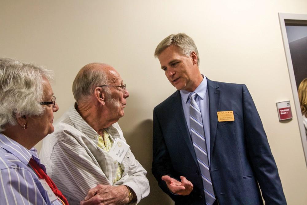 GVL / Sara Carte
Calvin Rehabilitation Center Clinic Director, Steve Vanderkamp, speaks with people about the center on Sept. 29.