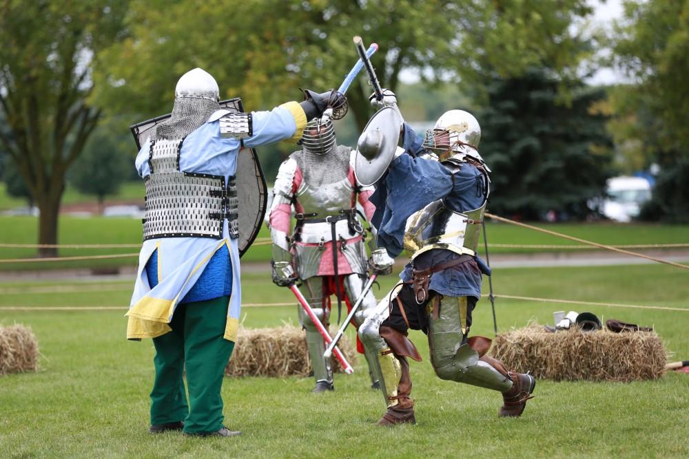 GVL / Kevin Sielaff    
John Brennan and Dan Peacock spar during the Renaissance festival. The annual Renaissance fair takes place Oct. 3-4 outside of the Kirkhoff Center in Allendale.