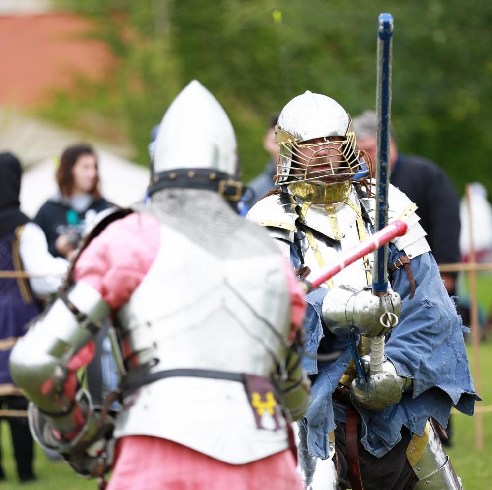 GVL / Kevin Sielaff    
John Brennan and Matt Kruchowski battle during the Renaissance fair. The annual Renaissance fair takes place Oct. 3-4 outside of the Kirkhoff Center in Allendale. 