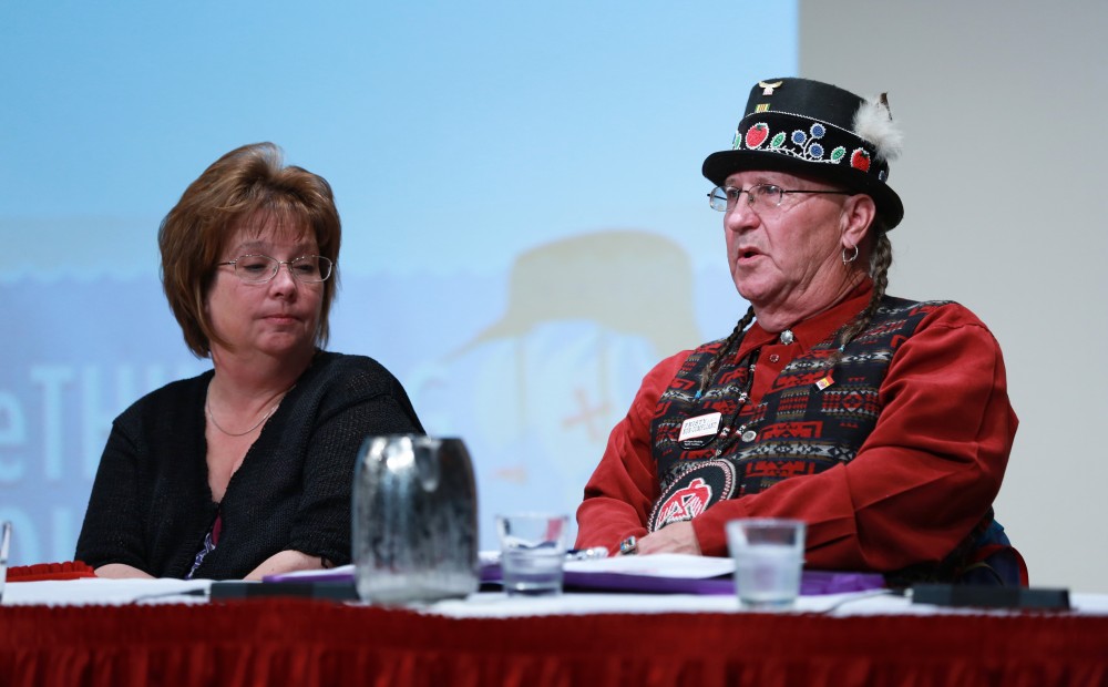 GVL / Kevin Sielaff      
Steve Perry, member of the GVSU Native American advisory board, speaks during the Re-Thinking Columbus event on Oct. 12 in Loosemoore Auditorium. 