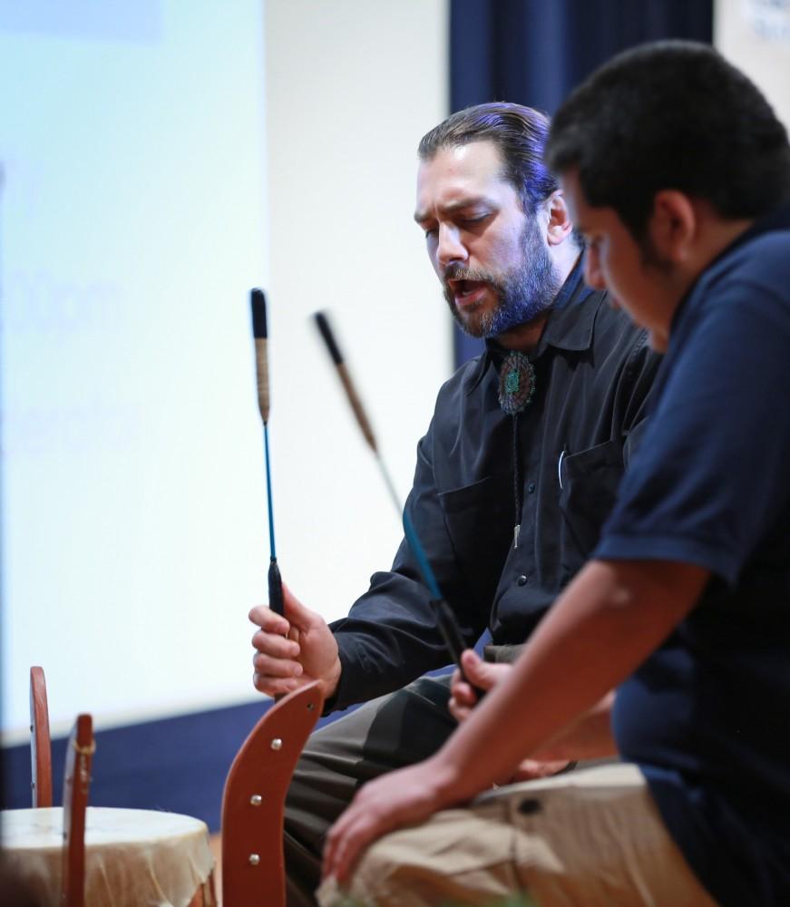 GVL / Kevin Sielaff      
Ben Williams plays a drum during the opening sequence to the Re-Thinking columbus event Oct. 12 in Loosemoore Auditorium. 