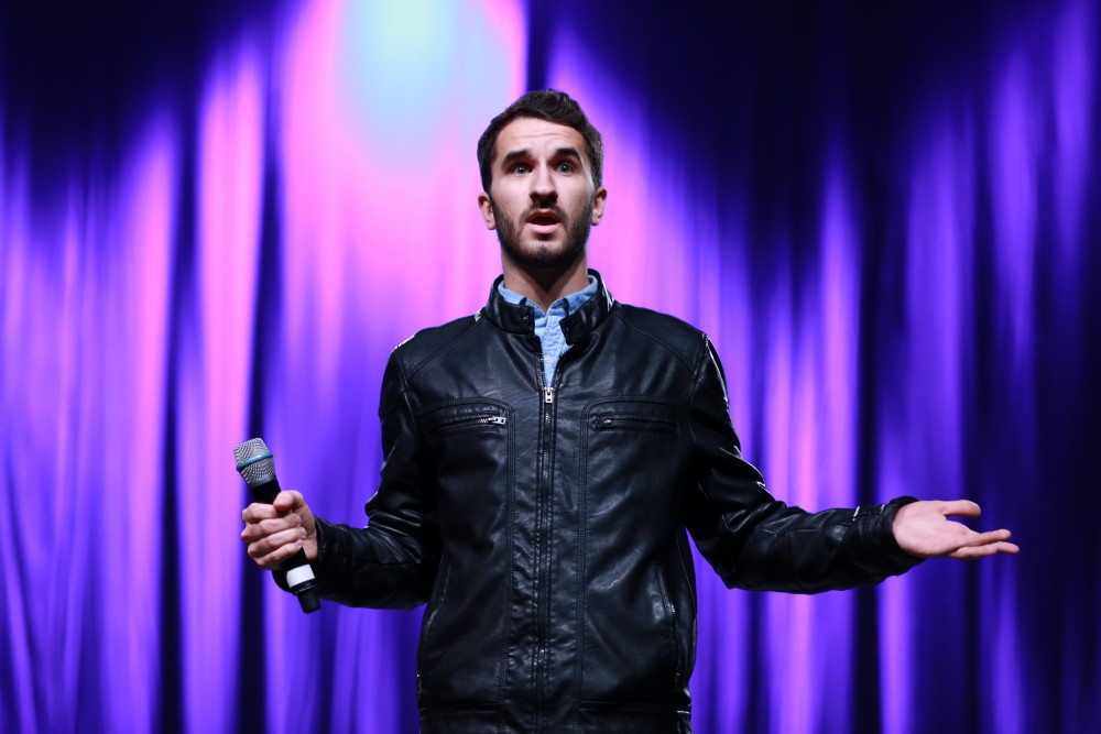 GVL / Kevin Sielaff - Joey Parks introduces Aidy Bryant before the start of the show.  Grand Valley hosts SNL comedians Aidy Bryant and Jay Pharoah inside the Fieldhouse Arena Oct. 22.