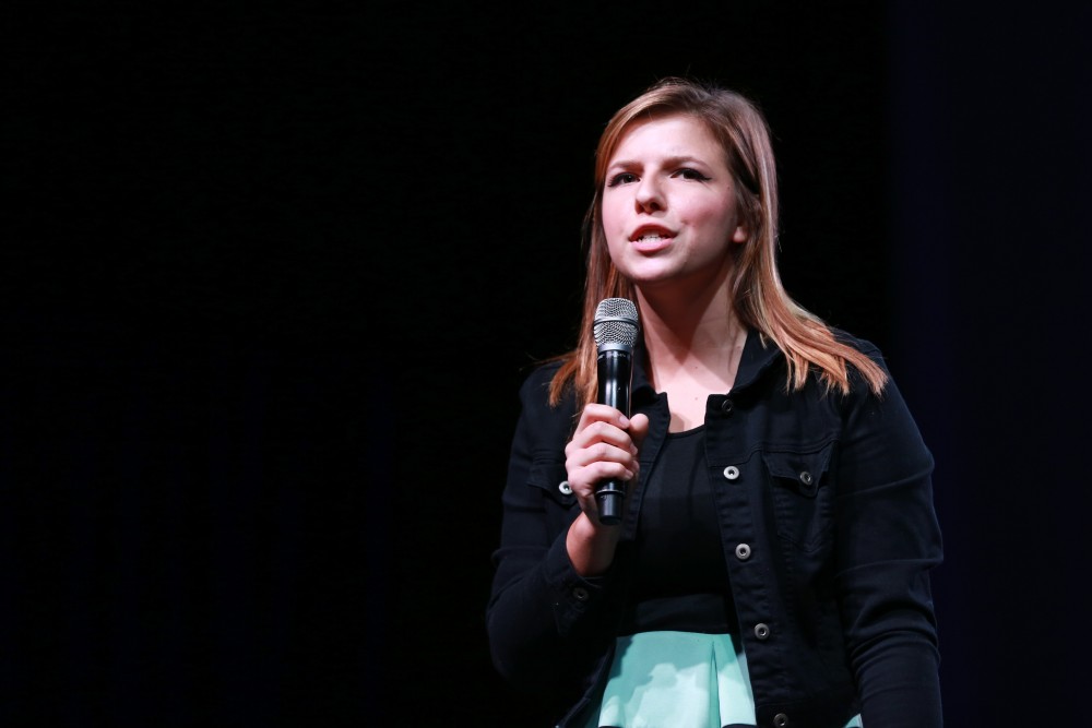 GVL / Kevin Sielaff - Bree Girard introduces Aidy Bryant before the start of the show.  Grand Valley hosts SNL comedians Aidy Bryant and Jay Pharoah inside the Fieldhouse Arena Oct. 22.