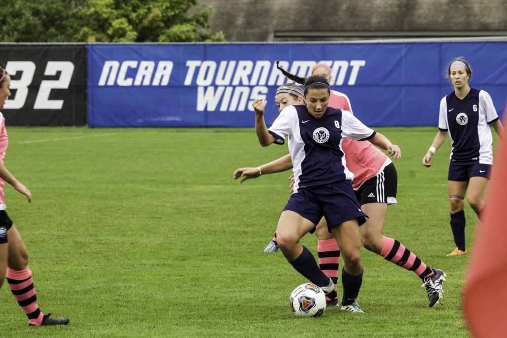 GVL / Sara Carte
Grand Valley’s Women’s Soccer player, Marti Corby, fights for the ball against Northwood on Oct. 4.