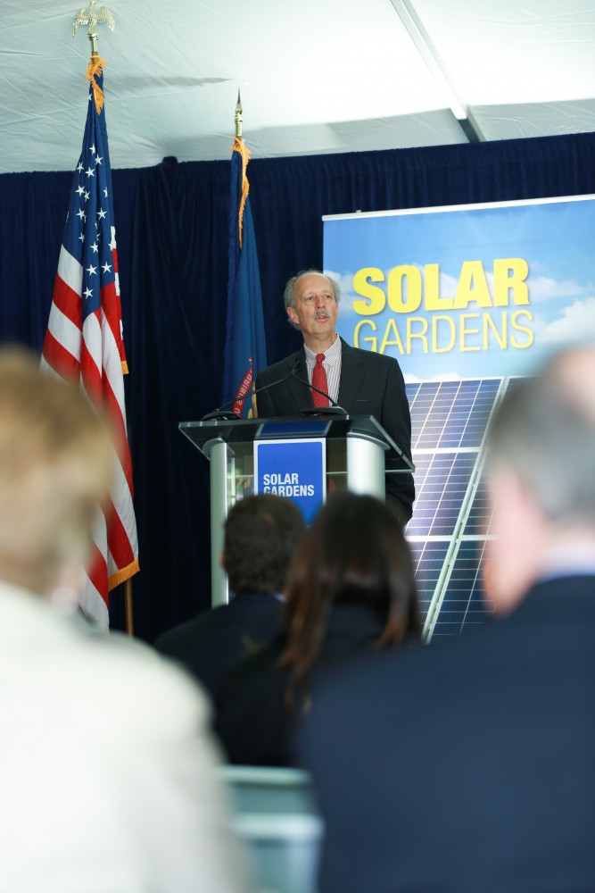 GVL / Kevin Sielaff -  Matthew E. McLogan introduces the project. Officials break ground on Grand Valley's solar garden Oct. 2 in Allendale. By next spring, 17 acres of land near 48th avenue will be generating 3 megawatts of electricity for the community.