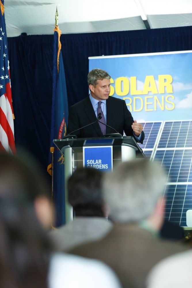 GVL / Kevin Sielaff - Congressman Bill Huizenga speaks to those gathered for the ground breaking. Officials break ground on Grand Valley's solar garden Oct. 2 in Allendale. By next spring, 17 acres of land near 48th avenue will be generating 3 megawatts of electricity for the community.