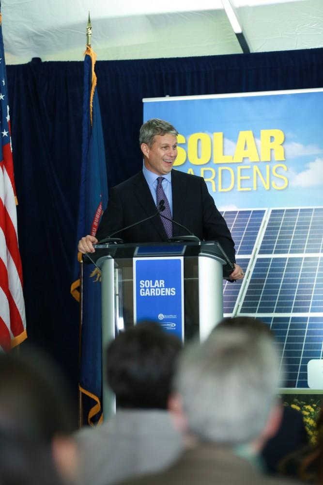 GVL / Kevin Sielaff - Congressmen Bill Huizenga speaks to those gathered for the ground breaking. Officials break ground on Grand Valley's solar garden Oct. 2 in Allendale. By next spring, 17 acres of land near 48th avenue will be generating 3 megawatts of electricity for the community.