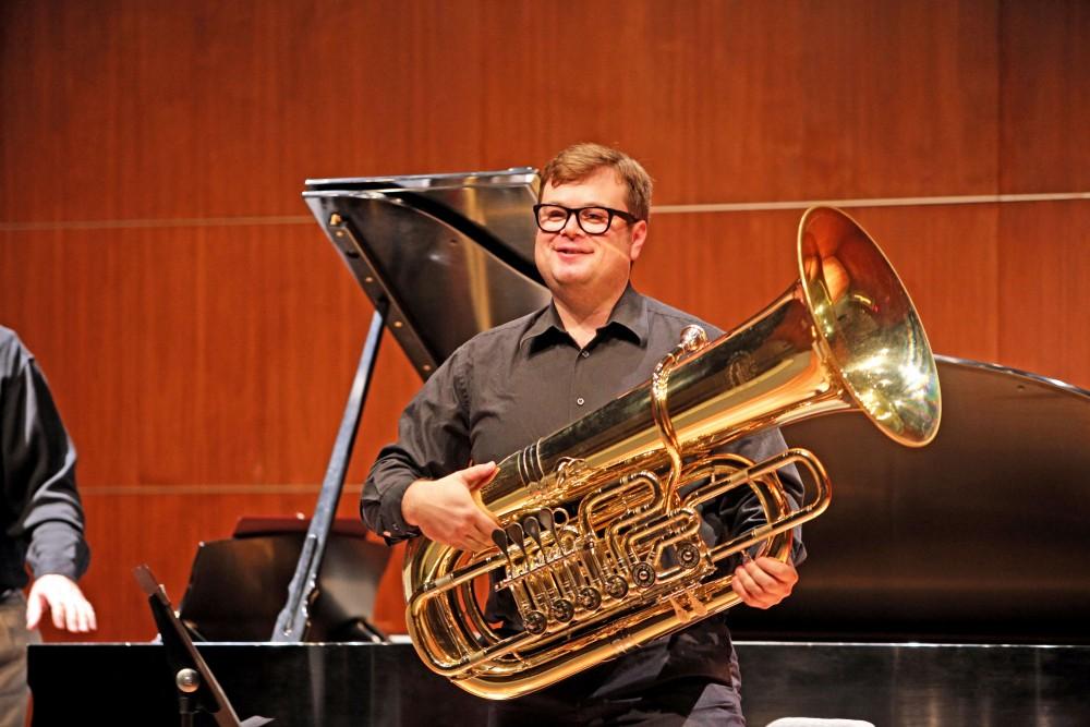 GVL / Emily Frye
Dr. Paul Carlson, Affiliate Professor of Tuba and Euphonium at Grand Valley State University, takes a moment to acknowledge the audience before his performance on Oct. 8th. Dr. Carlson is currently touring the country performing clinics and concerts with the Dallas Brass and is well experienced performing on the global stage. 