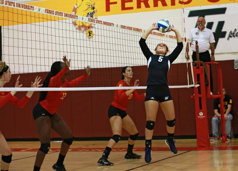 GVL / Kevin Sielaff
Taylor Stewart (5) sets the ball. The Lakers fall to the Bulldogs at Ferris State University Sept. 29 by a margin of 3-1. 