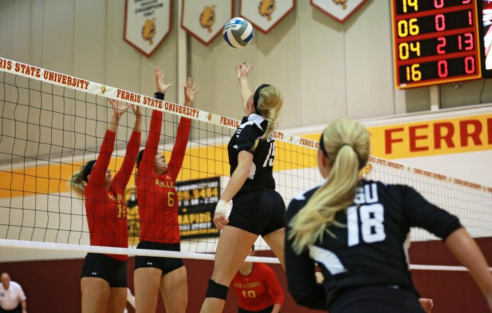 GVL / Kevin Sielaff
Kaleigh Lound (15) tips the ball over the net. The Lakers fall to the Bulldogs at Ferris State University Sept. 29 by a margin of 3-1. 