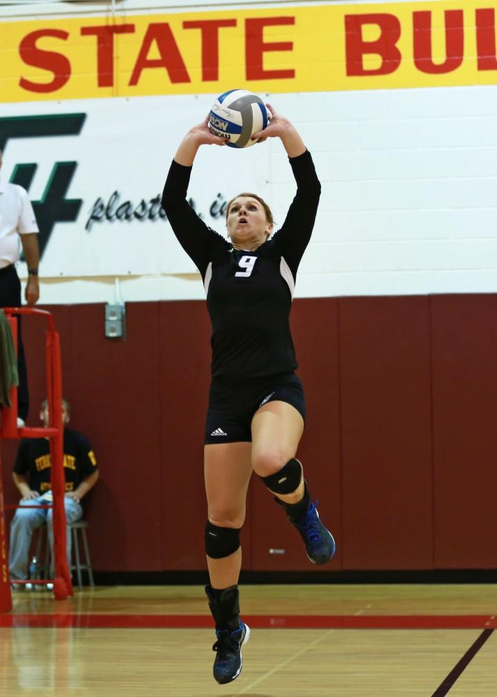 GVL / Kevin Sielaff
Katie Olson (9) sets the ball. The Lakers fall to the Bulldogs at Ferris State University Sept. 29 by a margin of 3-1. 